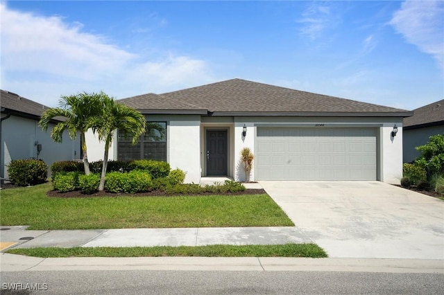 16044 Enclaves Cove Dr, North Fort Myers, FL 33917 - ranch-style house with an attached garage, driveway, a front yard, and stucco siding