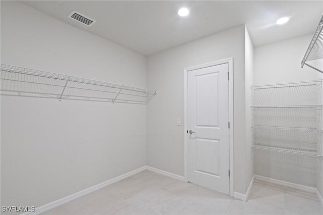 16044 Enclaves Cove Dr, North Fort Myers, FL 33917 - walk in closet featuring visible vents