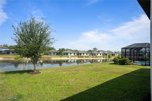 16044 Enclaves Cove Dr, North Fort Myers, FL 33917 - view of yard featuring a residential view, a lanai, a water view, and an outdoor pool