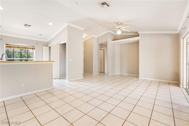 unfurnished living room featuring ceiling fan, ornamental molding, and visible vents