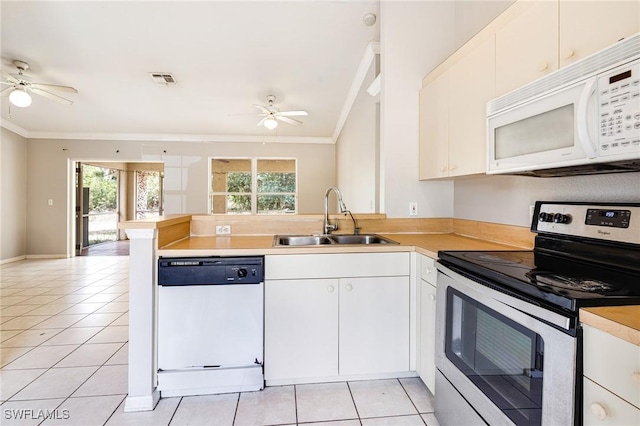 kitchen featuring a sink, ornamental molding, white appliances, and a ceiling fan