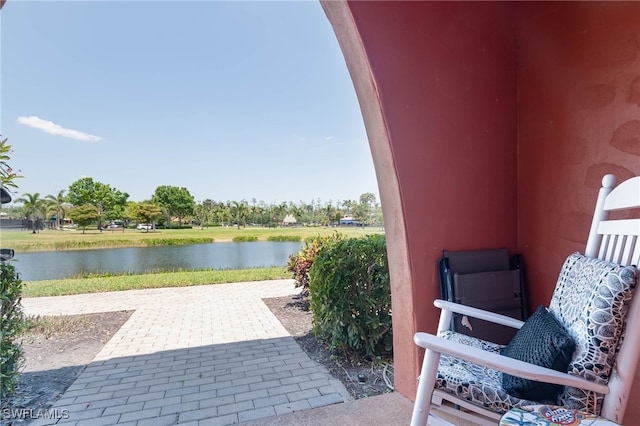view of patio / terrace featuring a water view