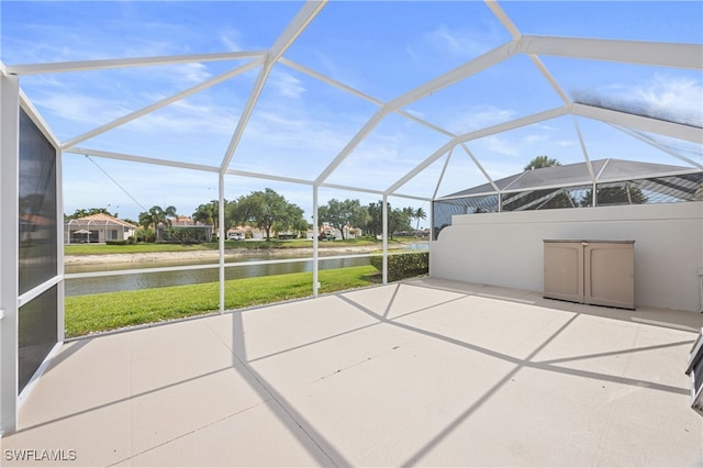 4788 San Carlo Ct, Naples, FL 34109 - unfurnished sunroom with a water view