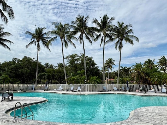4788 San Carlo Ct, Naples, FL 34109 - community pool with a patio area