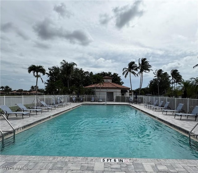 4788 San Carlo Ct, Naples, FL 34109 - community pool with a patio