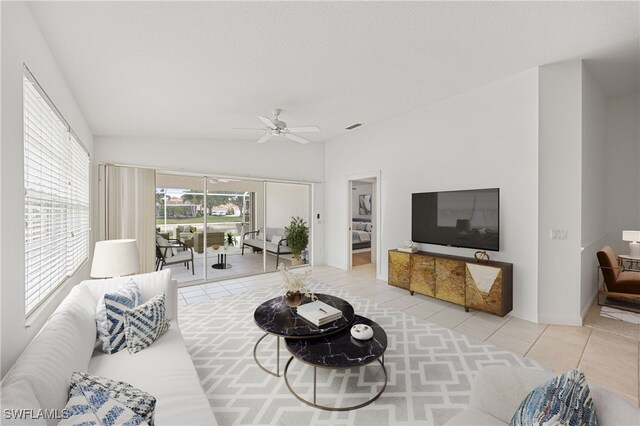 4788 San Carlo Ct, Naples, FL 34109 - living room with tile patterned flooring, a ceiling fan, and lofted ceiling