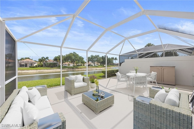 4788 San Carlo Ct, Naples, FL 34109 - view of patio / terrace featuring outdoor lounge area, a water view, outdoor dining area, and a lanai