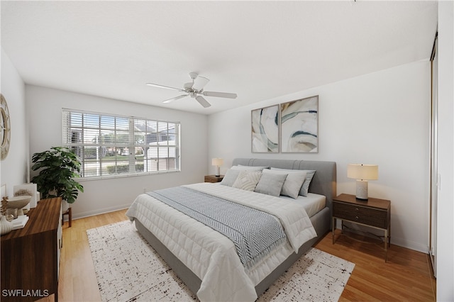 4788 San Carlo Ct, Naples, FL 34109 - bedroom featuring light wood-type flooring and ceiling fan