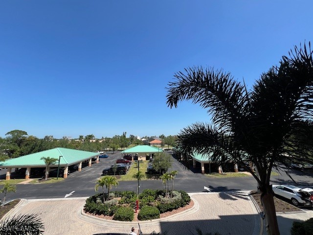 view of property's community featuring a gazebo and uncovered parking
