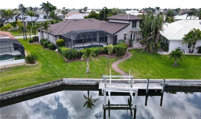 3787 Whippoorwill Ct, Punta Gorda, FL 33950 - dock area with a lawn, boat lift, a water view, and a residential view