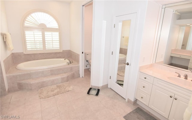 3787 Whippoorwill Ct, Punta Gorda, FL 33950 - bathroom featuring tile patterned floors, plenty of natural light, a garden tub, and vanity
