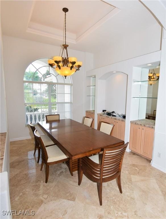 3787 Whippoorwill Ct, Punta Gorda, FL 33950 - dining area with a raised ceiling and a chandelier