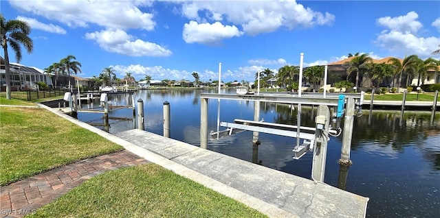 3787 Whippoorwill Ct, Punta Gorda, FL 33950 - dock area featuring a water view, a yard, boat lift, and a residential view