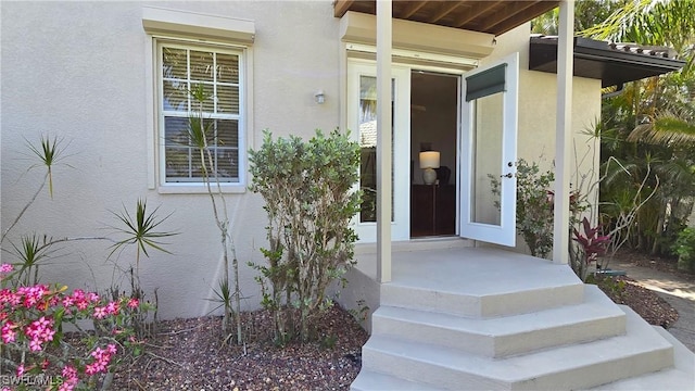 3787 Whippoorwill Ct, Punta Gorda, FL 33950 - property entrance featuring stucco siding