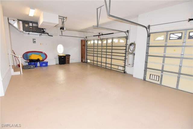 3787 Whippoorwill Ct, Punta Gorda, FL 33950 - garage featuring a garage door opener