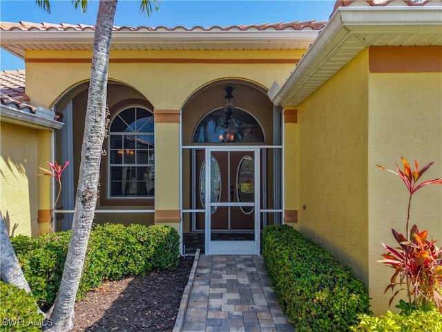 20710 Mystic Way N, Fort Myers, FL 33917 - entrance to property featuring stucco siding and a tiled roof