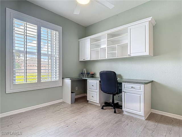 20710 Mystic Way N, Fort Myers, FL 33917 - office area featuring a ceiling fan, light wood-style flooring, built in desk, and baseboards