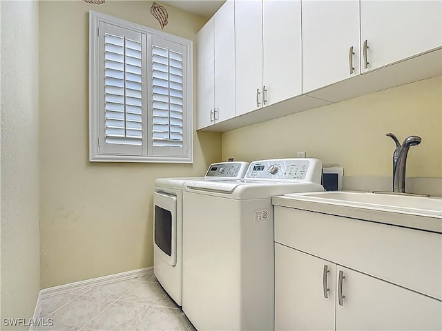 20710 Mystic Way N, Fort Myers, FL 33917 - clothes washing area with cabinet space, independent washer and dryer, baseboards, and light marble finish floors
