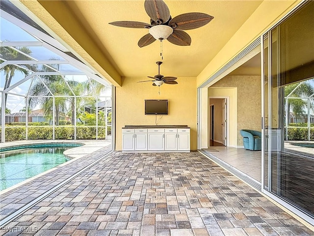20710 Mystic Way N, Fort Myers, FL 33917 - view of patio / terrace with ceiling fan, a lanai, and an outdoor pool