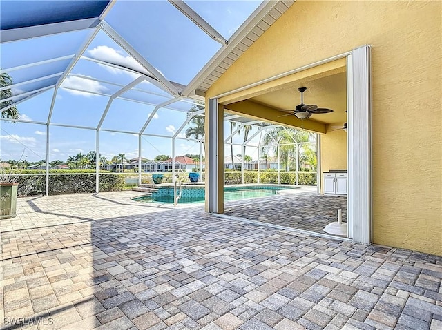 20710 Mystic Way N, Fort Myers, FL 33917 - view of patio / terrace with an outdoor pool, glass enclosure, and a ceiling fan