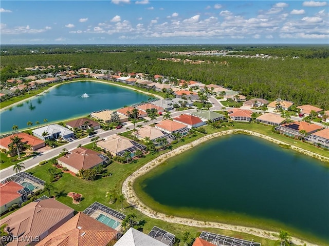20710 Mystic Way N, Fort Myers, FL 33917 - aerial view of residential area featuring a nearby body of water and a heavily wooded area