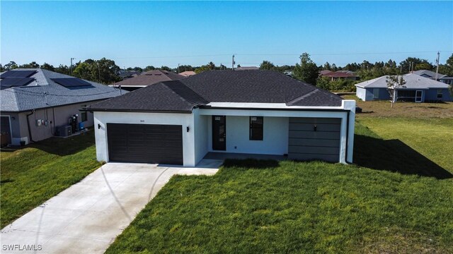 3610 22nd St SW, Lehigh Acres, FL 33976 - ranch-style home featuring a garage, stucco siding, a front yard, concrete driveway, and cooling unit