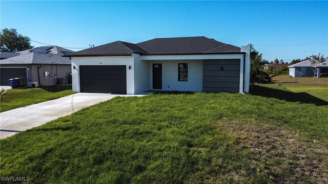 3610 22nd St SW, Lehigh Acres, FL 33976 - single story home featuring a garage, a front lawn, stucco siding, and concrete driveway