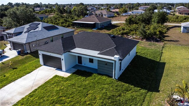 3610 22nd St SW, Lehigh Acres, FL 33976 - birds eye view of property featuring a residential view