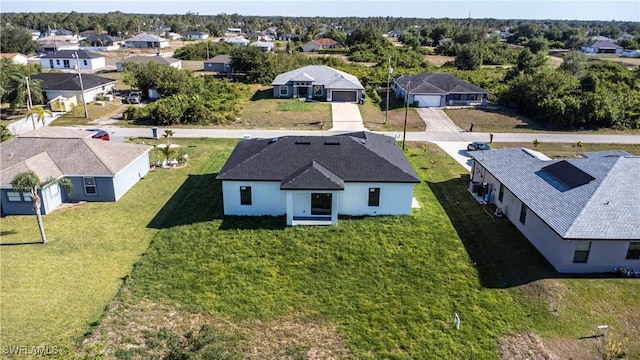 3610 22nd St SW, Lehigh Acres, FL 33976 - drone / aerial view with a residential view
