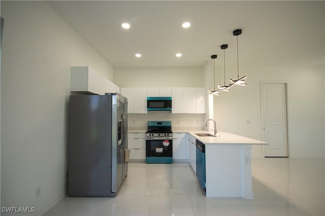 3610 22nd St SW, Lehigh Acres, FL 33976 - kitchen featuring a peninsula, recessed lighting, white cabinets, a sink, and stainless steel appliances