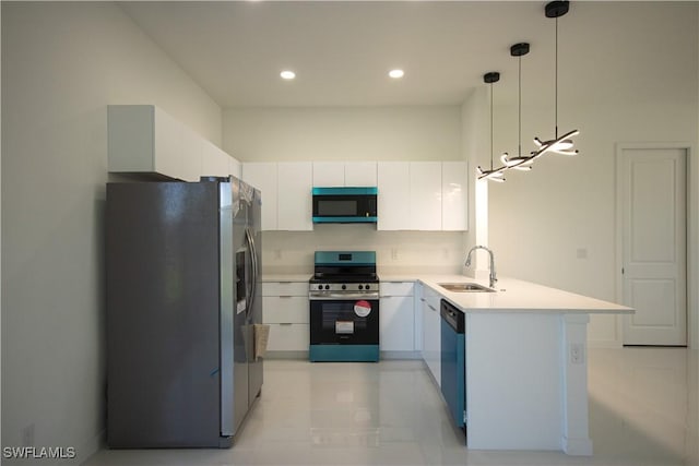 3610 22nd St SW, Lehigh Acres, FL 33976 - kitchen featuring appliances with stainless steel finishes, a sink, light countertops, a peninsula, and white cabinetry