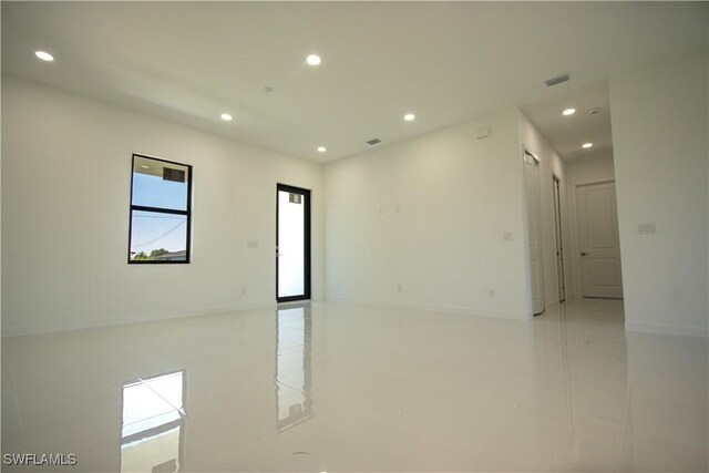 3610 22nd St SW, Lehigh Acres, FL 33976 - empty room featuring recessed lighting, baseboards, and visible vents