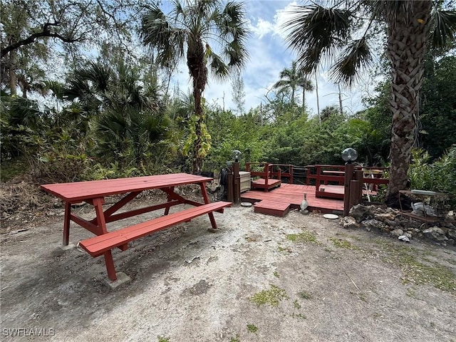 view of home's community featuring a wooden deck
