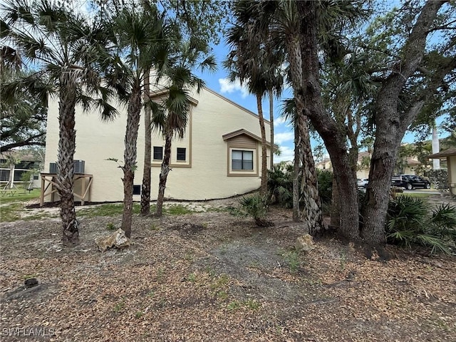 view of home's exterior with stucco siding