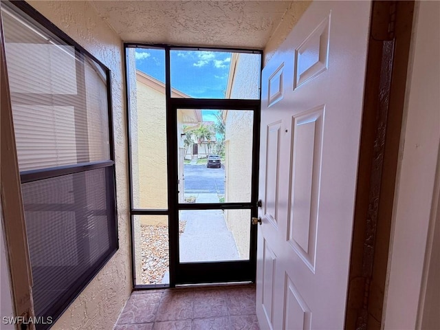 doorway with a textured wall