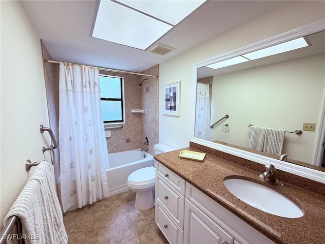bathroom featuring visible vents, shower / bath combo with shower curtain, vanity, toilet, and tile patterned floors