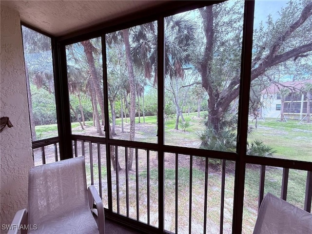sunroom / solarium with a wealth of natural light