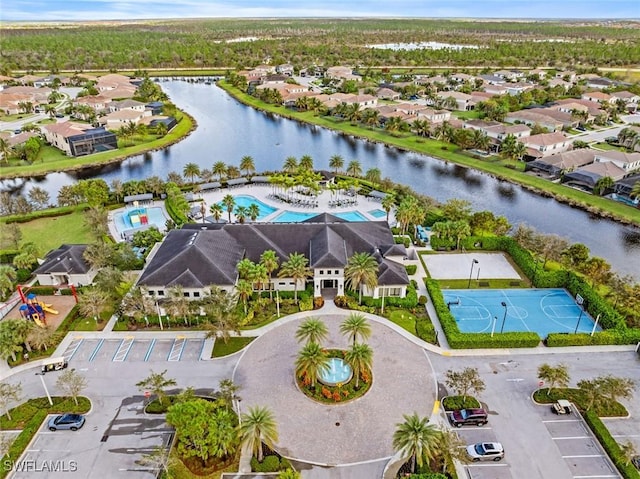 aerial view with a water view and a residential view