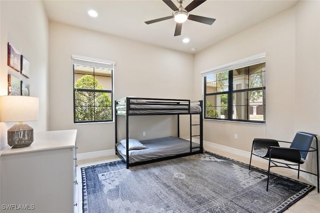bedroom with baseboards, recessed lighting, and a ceiling fan