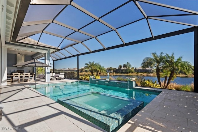 6250 Lightbourn Way, Naples, FL 34113 - view of pool featuring a pool with connected hot tub, a patio, a water view, a ceiling fan, and a lanai