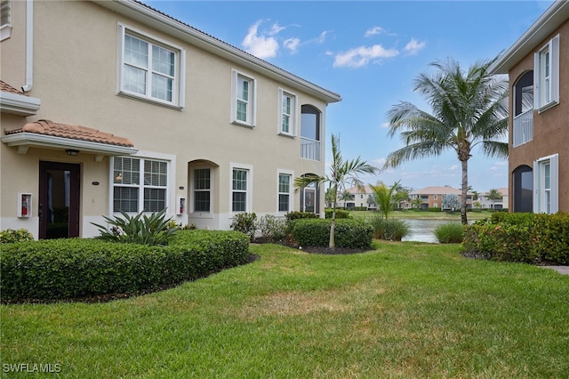 view of yard with a water view
