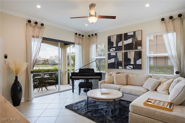 sitting room with light tile patterned floors, crown molding, a ceiling fan, and recessed lighting