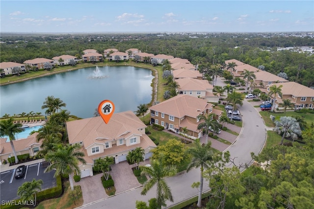 aerial view featuring a water view and a residential view