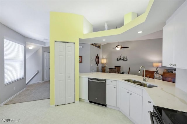 kitchen featuring white cabinets, light stone countertops, a sink, dishwasher, and a ceiling fan