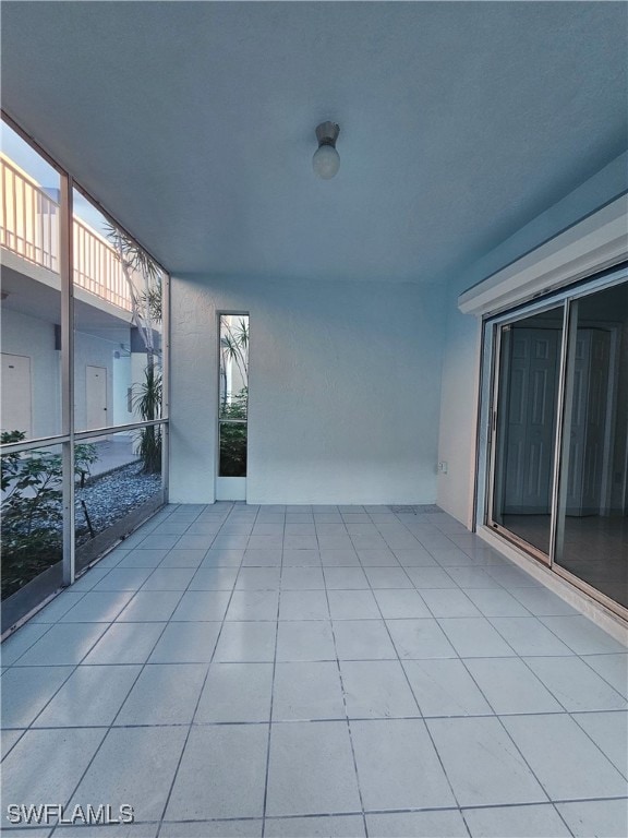 6025 Chardonnay Ln Unit 102, Naples, FL 34119 - view of patio / terrace featuring a balcony