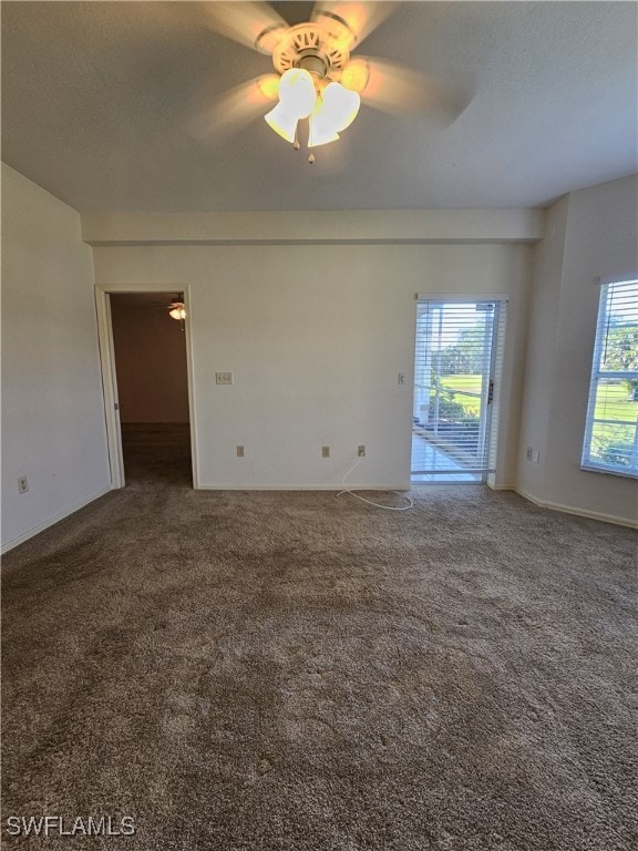 6025 Chardonnay Ln Unit 102, Naples, FL 34119 - carpeted spare room featuring a ceiling fan and baseboards