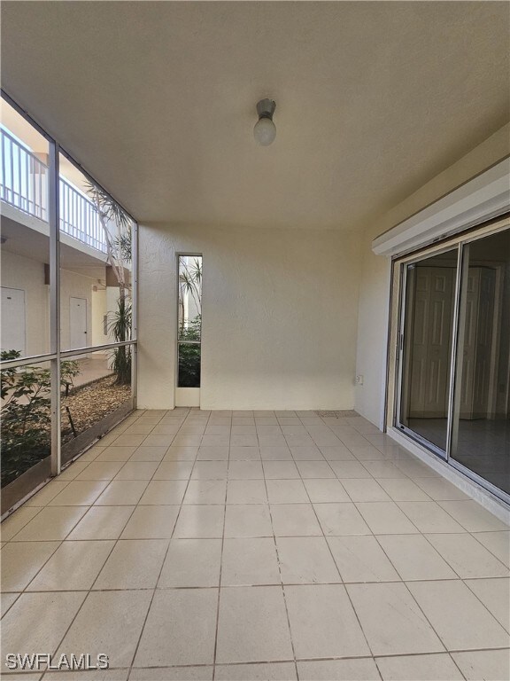 6025 Chardonnay Ln Unit 102, Naples, FL 34119 - view of patio / terrace
