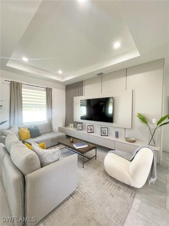 7414 Banbury Ter, Port Charlotte, FL 33981 - living area featuring recessed lighting, a tray ceiling, and marble finish floor
