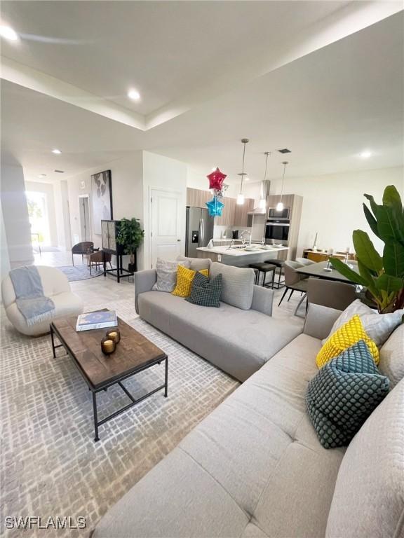 living area with recessed lighting