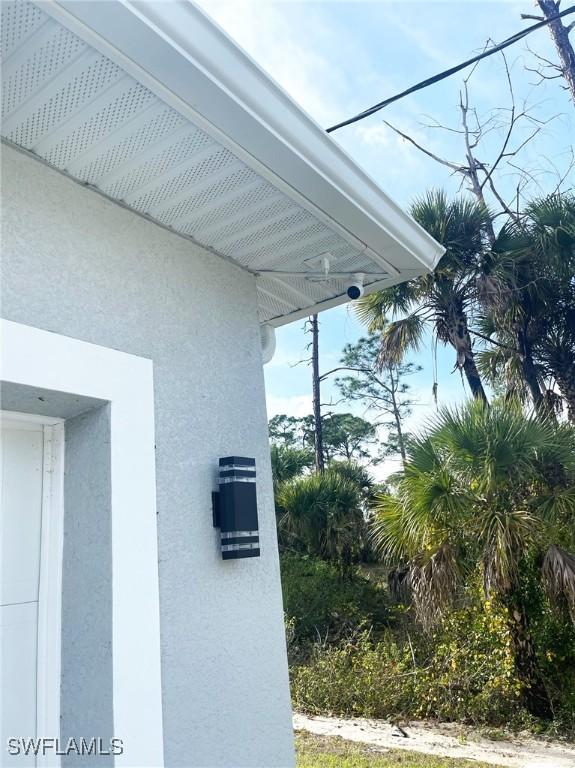 exterior details featuring stucco siding